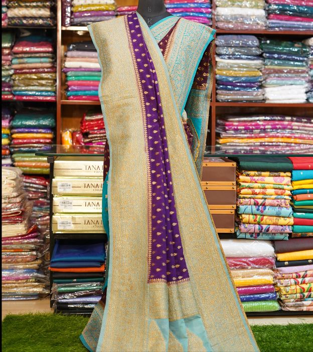 Elegant Semi Pure Khaddi Georgette Saree With Contrast Teal Border