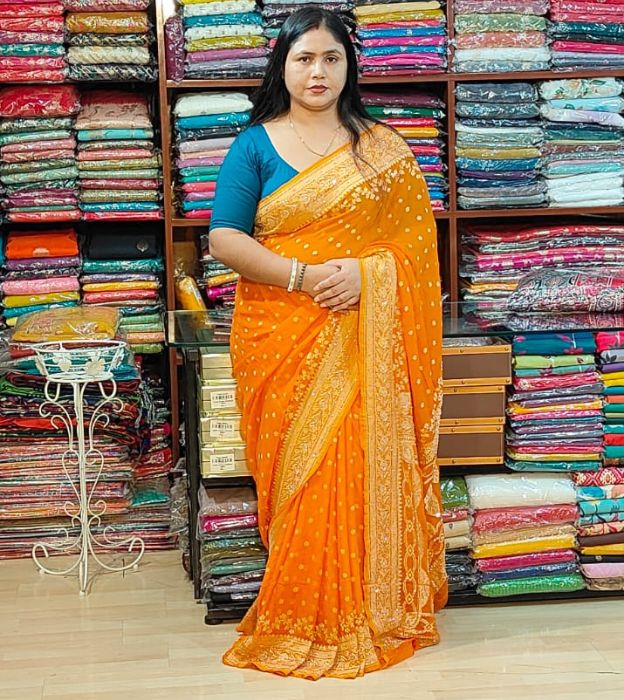 Radiant Orange Khaddi Georgette Zardozi Saree